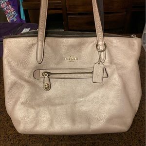 Rose gold Coach handbag